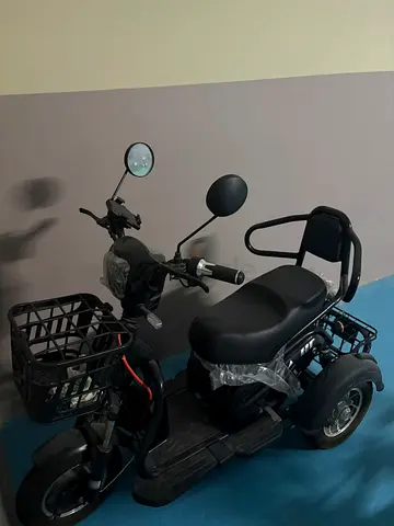 Electric adult tricycle with basket — good condition