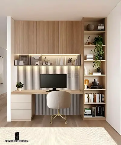 Built-in wooden study desk with shelving and overhead cabinets