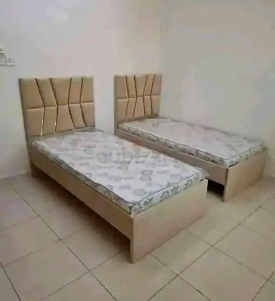 Stylish single bed with mattress