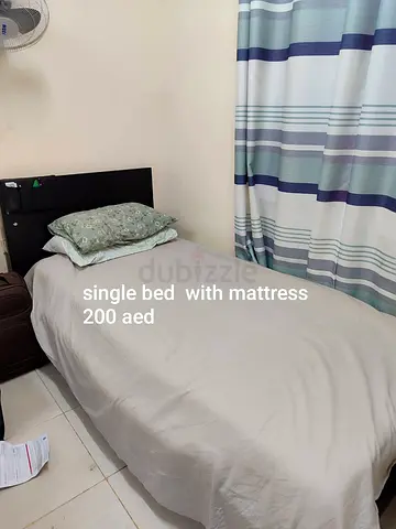 Single bed with mattress - good condition (200 AED)