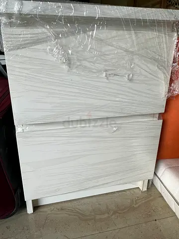 White bed side table