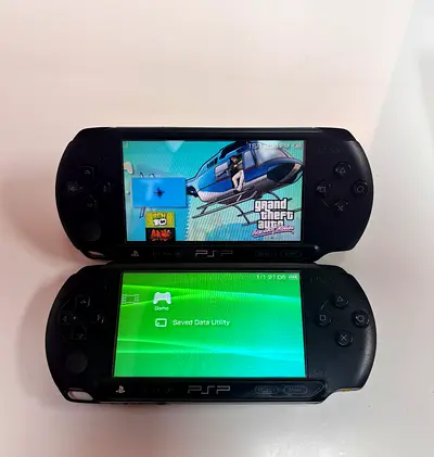 2x Sony PSPs good condition with some games and charger