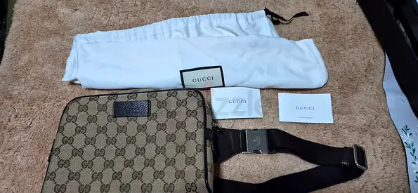 Gucci monogram crossbody/shoulder bag with strap — good condition