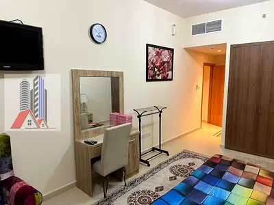Furnished 2-bedroom apartment with living room for monthly rent in Ajman One Towers - Al Rashidiya Includes bills . Luxurious furnishings.