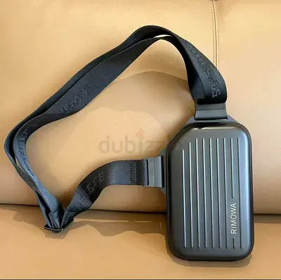 RIMOWA PERSONAL ALUMINIUM SLING CLUTCH