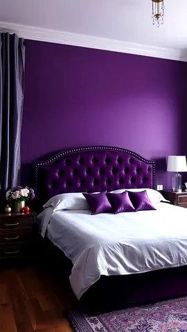Purple tufted upholstered queen bed with nightstands