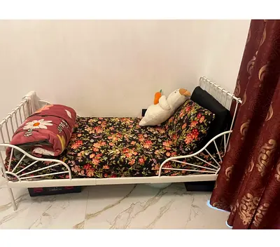 2 White Metal Single Daybed with Floral Mattress,extendable.