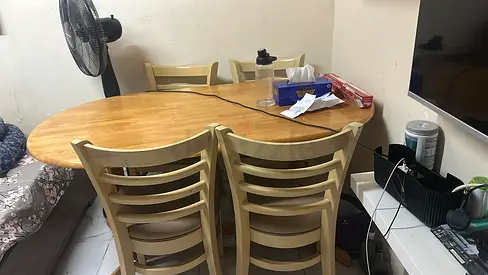 Solid wood oval dining table with 4 matching chairs - light finish
