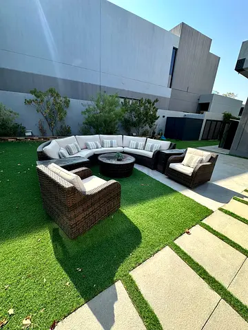 7-piece outdoor rattan patio sofa set 8p. with cushions (curved sectional + 2 chairs + coffee table)