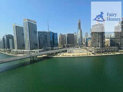 Canal View & Burj Khalifa View 1BR | Corner Unit