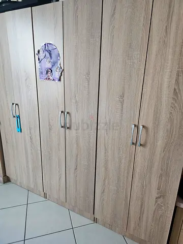 Light wood wardrobe in excellent condition. 3 two door wardrobes.