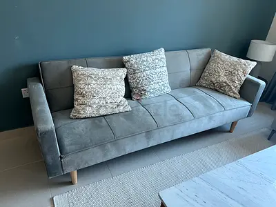 Grey 3-seater sofa bed without cushions - good condition