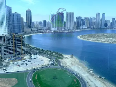 شقة غرفتين وصالة للايجار على كورنيش الخان بإطلالة بحرية مباشرة وجميع الغرف مطلة على البحر مع باركينغ