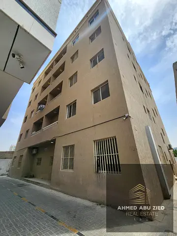 Investment Building for Sale in Al Rashidiya 2, Ajman, generating AED 907K annual income with 10.08% ROI, 37 apartments, prime location near Ladies Pa