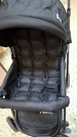 Teknum black standard stroller in good used condition Price negotiable