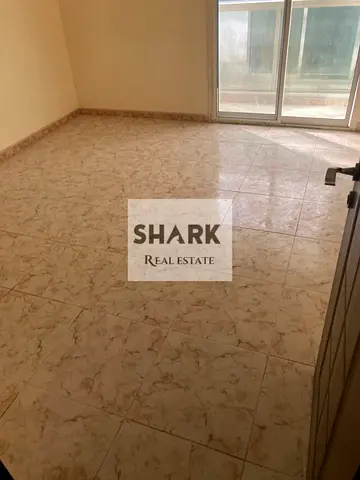 For Annual Rent in Ajman One bedroom and living room with a balcony Bathroom Kitchen Split A/C Suit