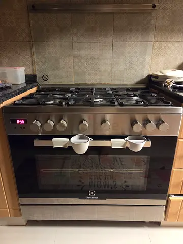 Large stainless steel gas range with oven - very good working condition