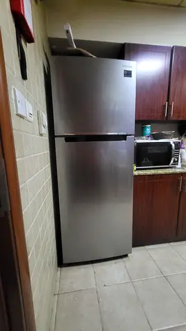Double-door Samsung refrigerator in very good condition