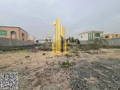 Land for sale in Al Aliya, Ajman, boasting a prime location on three streets.