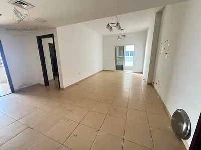 A spacious 1-bedroom apartment with 3 balconies, a gym, swimming pool, private parking central air
