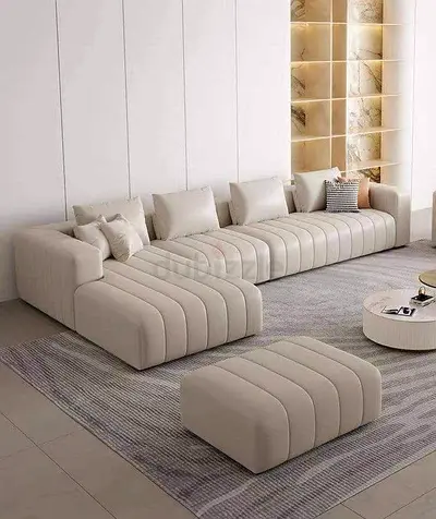 Modern modular beige fabric sectional sofa with ottoman