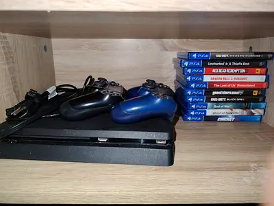 Sony PS4 Slim and 10 Games - Good Working Condition NOTE NO CONTROLLER BOTH ARE BROKEN