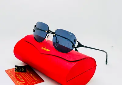 Cartier rimless blue lens sunglasses with red case - preowned in very Good price and smooth Quality