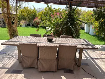 Marina home Outdoor dining table with 6 slipcovered chairs