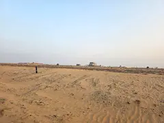 Three commercial/industrial plots of land for sale in Al Qasimia City, Phase 3.