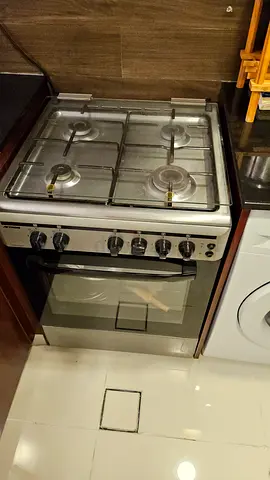 Aftron 4 Gas Burners Cooker and oven. Along with free 4 seater dining table