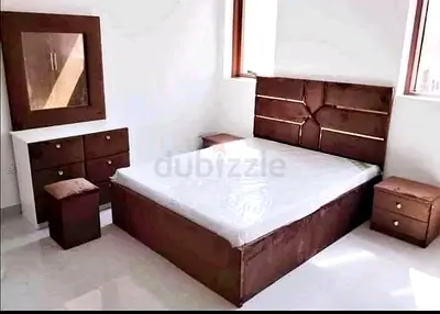 Selling new Bed with mattresses and dressing table with mirror for sale