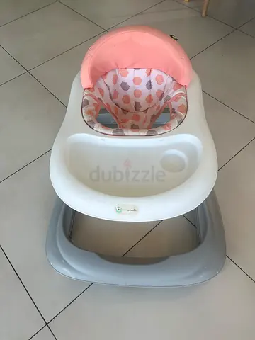 Baby walker with removable tray and soft pink seat