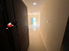 One-bedroom apartment with a living room for annual rent in Al Hamidiya, Ajman. Features a balcony a