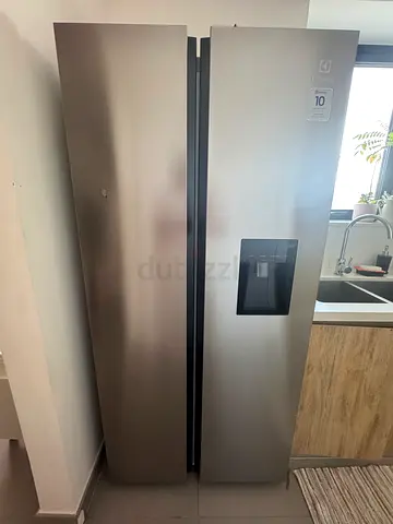 Electrolux Side-by-Side Refrigerator with Water Dispenser - Good Condition