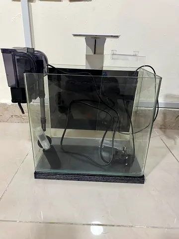 Small glass aquarium tank with hang-on filter and heater (used)