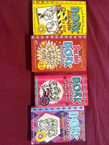 Set of 4 Dork Diaries paperback books by Rachel Renee Russell