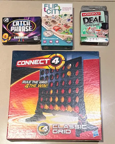 Set of 4 board games/card games Monopoly Deal Flip City Catchphrase Connect 4
