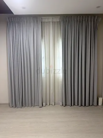 Light grey full-length blackout curtains with sheer liners - set of panels