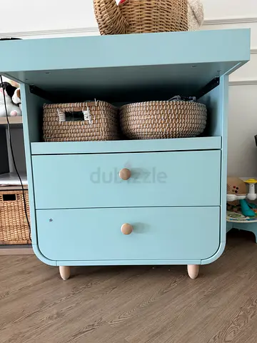 Changing table with crib for the baby