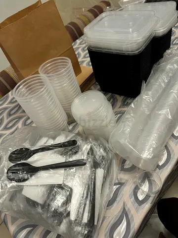 Bulk disposable food containers, cups and cutlery set - unused