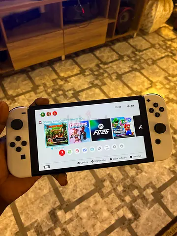 Nintendo Switch OLED (White) - Good Condition, Ready to Play.