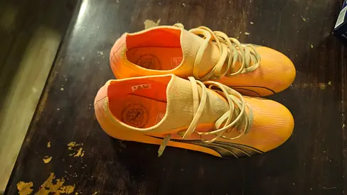 Lightweight puma ultra coral/orange football boots, size 42 US 9, gently used