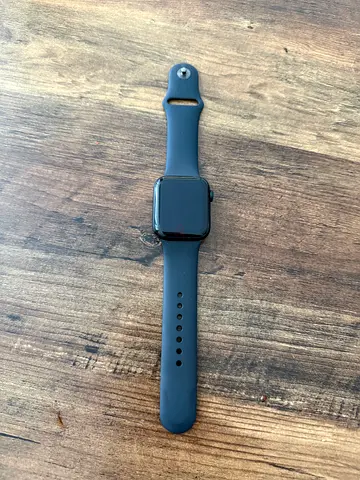 Used Apple Watch-style Smartwatch with Black Silicone Band , with charger. Battery capacity 94%