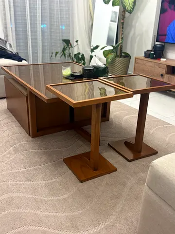 Coffee table with a glass top, coming with 2 storage units usable as chairs, and 2 side tables