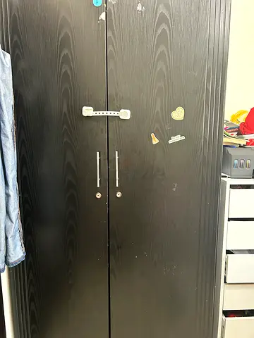 Good condition black 2-door wardrobe with shelves