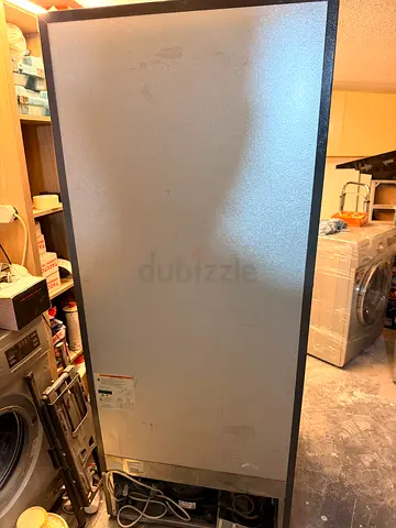 Tall single-door refrigerator / freezer unit - used, good condition