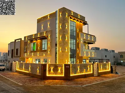 Modern corner villa with 5 bedrooms, pool, and roof terrace in Al-Haliyo 2 area. Includes water and electricity. Freehold ownership. Bank financing av