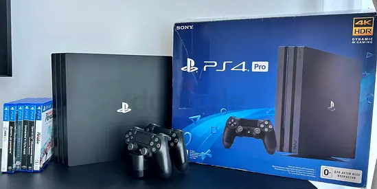 PS4 Pro 1TB – Full Bundle | 2 Controllers + Charging Station + 6 Games + Original Box