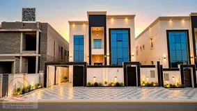 Villa for sale in Ajman, Al Zahiyah area. 5 master bedrooms, majlis, 2 living rooms, and maid's room
