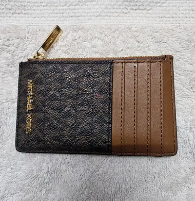 Selling all 2 pcs card holders and 2 pcs pouch - original in good condition